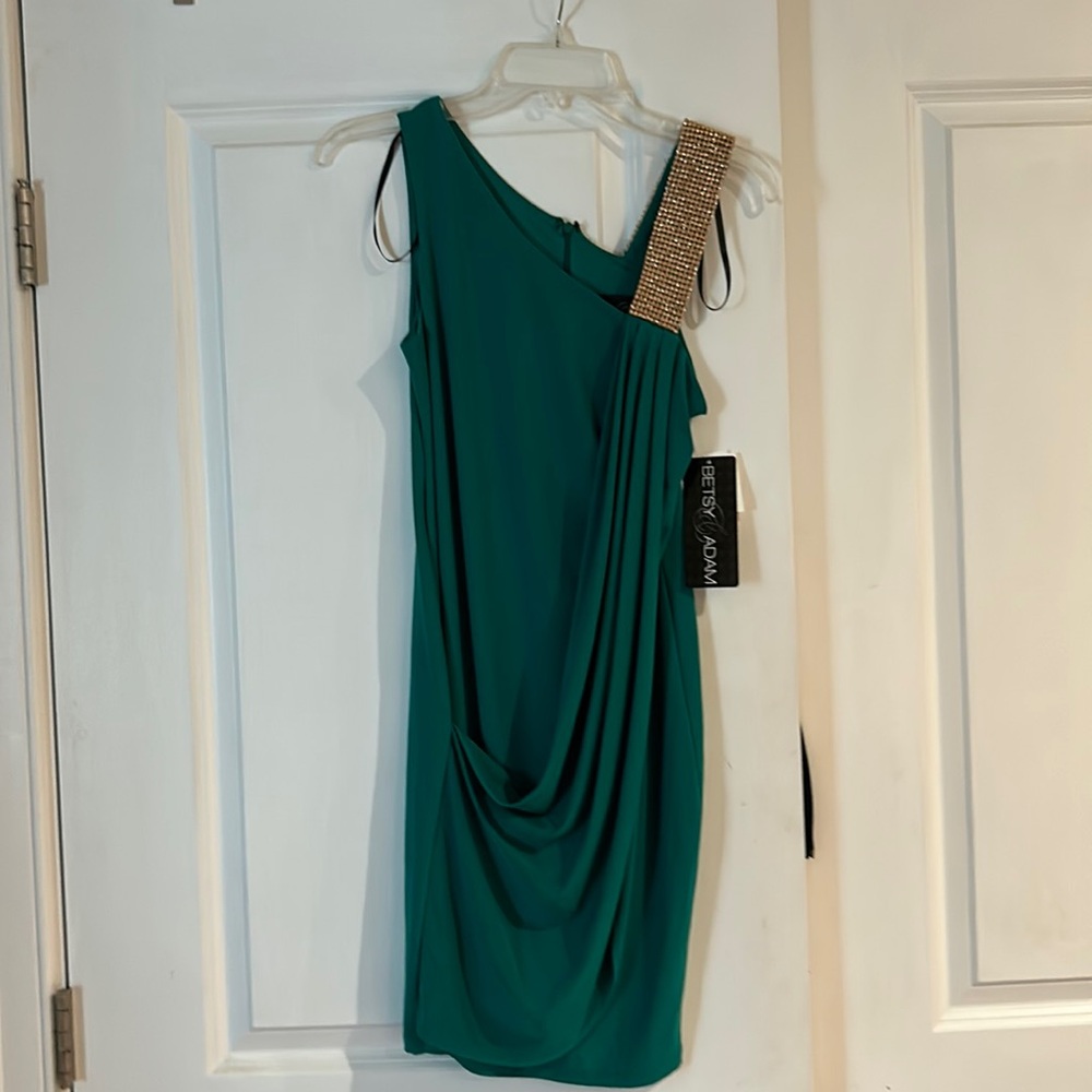 Green with gold shoulder strap.